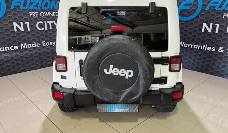
								Jeep Wrangler Unlimited 3.6 Sahara At full									