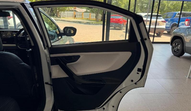 
								Tata Curvv 1.2T Creative Dca full									