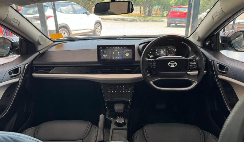 
								Tata Curvv 1.2T Creative Dca full									