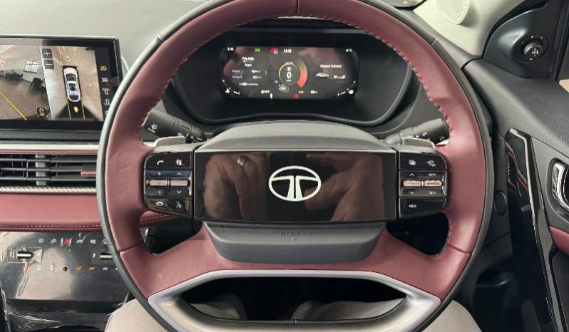 
								Tata Curvv 1.2T Accomplished S Dca full									