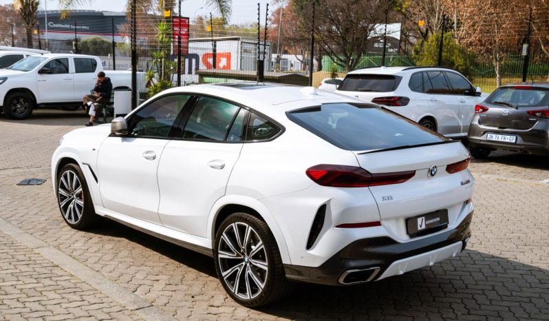 
								BMW X6 M50i full									