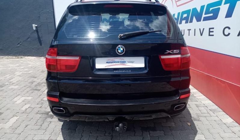 
								BMW X5 4.8I Exclusive Steptronic full									