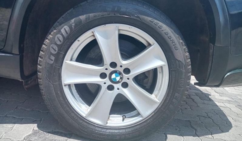 
								BMW X5 4.8I Exclusive Steptronic full									
