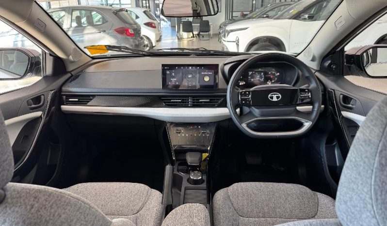 
								Tata Curvv 1.2T Creative Dca full									