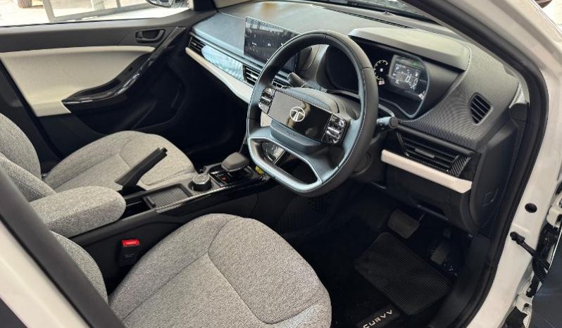 
								Tata Curvv 1.2T Creative Dca full									